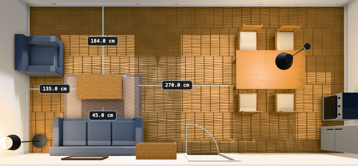 A living room seen from straight above with the coffee table selected. Four
                gap readings surround it: 45.0 cm to the sofa, 135.0 cm to the side wall,
                184.0 cm to the window wall and 270.0 cm across to the dining chairs.